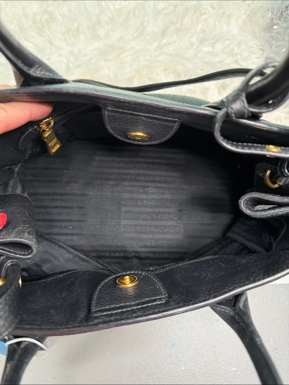 Authentic Prada Black  Leather Satchel with Gold Logo .